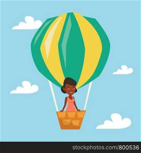 Woman flying in a hot air balloon. African woman standing in the basket of hot air balloon. Woman traveling in aerostat. Girl riding a hot air balloon. Vector flat design illustration. Square layout.. Woman flying in hot air balloon.