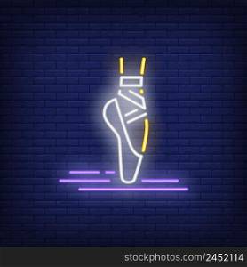 Woman leg wearing pointe ballet shoe neon sign. Dance studio or performance design. Night bright neon sign, colorful billboard, light banner. Vector illustration in neon style.