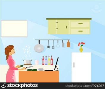 Woman making food by looking at internet cooking methods in the kitchen. With kitchenware in the background