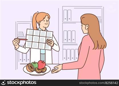 Woman receives advice from nutritionist on proper nutrition and diet to lose weight or improve health. Girl working as nutritionist demonstrates calendar and recommends eating more vegetables. Woman receives advice from nutritionist on nutrition and diet to lose weight or improve health