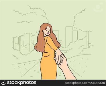 Woman says follow me and takes boyfriend to park for friendly or romantic date in summer nature. Happy girl holding friend hand and turning around, posing for photo in follow me style. Woman says following me and takes boyfriend to park for friendly or romantic date in nature