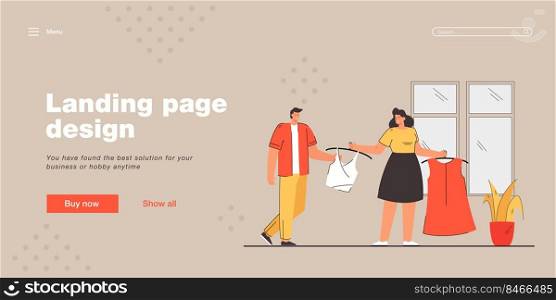 Woman showing new clothes to man. Wife showing new top and dress to husband. Clothes shopping. Shopping concept for banner, website design or landing web page 