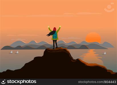 woman stands at the top of the mountain happily. There are sea, mountains and sunset background