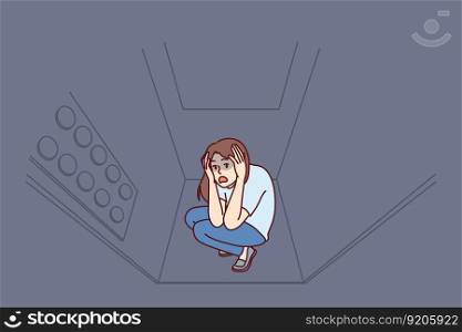 Woman stuck in elevator is claustrophobia and panic attack due to phobia of enclosed spaces. Young girl rides in moving elevator in need of psychological help to treat claustrophobia. Woman stuck in elevator is claustrophobic and panic attack due to phobia of enclosed spaces
