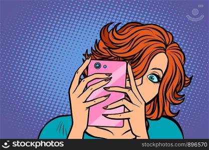 woman taking pictures with a smartphone. Pop art retro vector illustration drawing. woman taking pictures with a smartphone