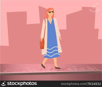 Woman walking on street near road. On background silhouettes of city buildings. Border separate pathway and asphalted roadway. Person in blue dress and pink cardigan. Vector illustration in flat style. Woman Walking on Street, Silhouettes of Buildings