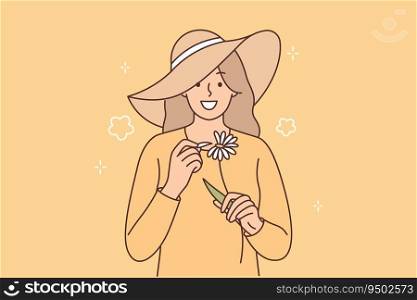 Woman with chamomile in hands and fortune-telling, tearing out petals from flower and saying loves or dislikes. Girl with chamomile is experiencing romantic emotions enjoying good spring weather. Woman with chamomile in hands and fortune-telling, tearing out petals from flower