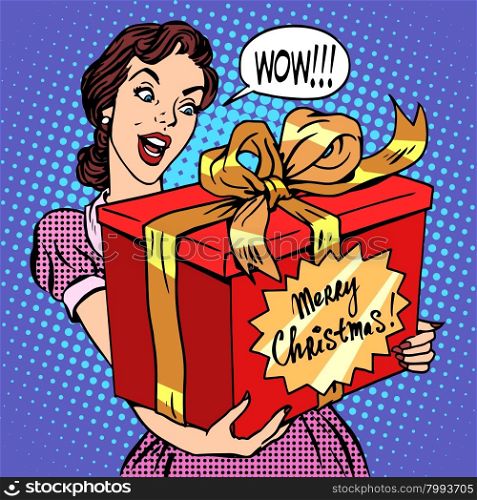 Woman with Christmas gift pop art retro style. Beautiful girl with a big red box with the words merry Christmas. Celebrations and congratulations. Family and joy. Woman with Christmas gift
