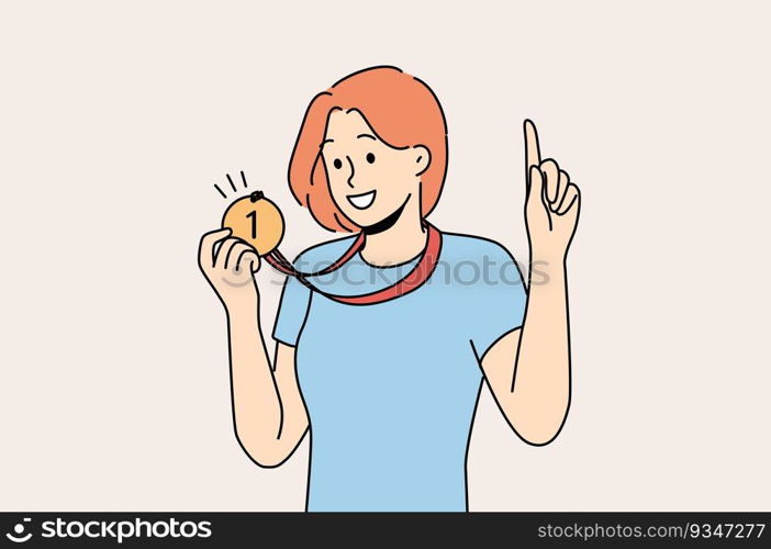 Woman with medal for first place won sports competition and is proud of trophy pointing finger up. Girl ch&ion boasts of award for winning olympiad or participants in competition among colleagues. Woman with medal for first place won sports competition and is proud of trophy pointing finger up