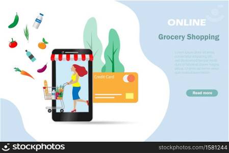Woman with shopping cart full of grocery foods making online payment via credit card on smart phone. Idea for digital payment, online grocery shopping, internet banking and delivery technology concept