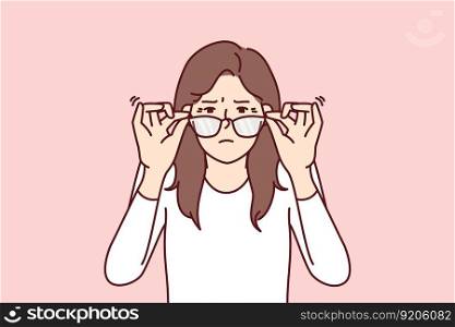 Woman with vision problems squint when touching does not help them see fine print at distance. Young girl loses vision and needs help of ophthalmologist or vitamin with beneficial substances for eyes. Woman with vision problems squint when touching does not help them see fine print at distance