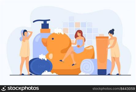 Women wrapped in towels using sponge and soap among bath accessories, tubes and shampoo bottles. Vector illustration for bathroom, spa, routine, hygiene concept