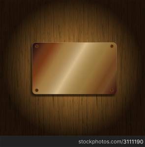 Wood background with metallic plate