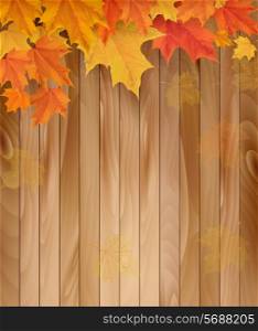 Wooden background with autumn leaves. Vector.