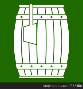 Wooden barrel with ladle icon white isolated on green background. Vector illustration. Wooden barrel with ladle icon green
