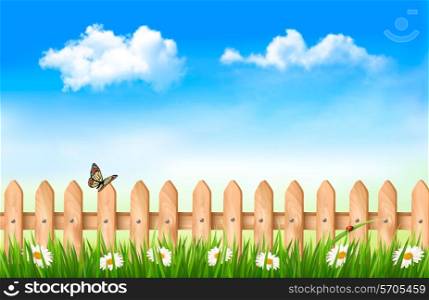 Wooden fence in grass with flowers and a butterfly. Vector.