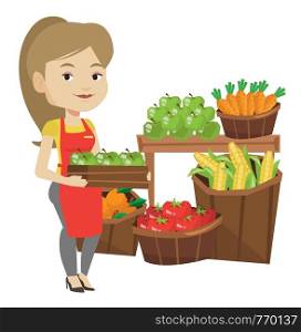 Worker of grocery store standing in front of section with vegetables and fruits. Female worker of grocery store holding a box with apples. Vector flat design illustration isolated on white background.. Supermarket worker with box full of apples.