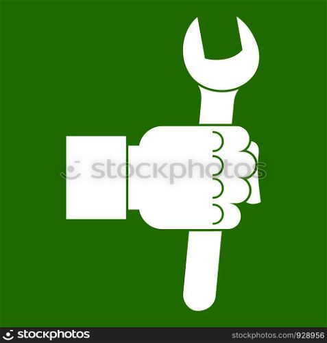 Wrench tool in man hand icon white isolated on green background. Vector illustration. Wrench tool in man hand icon green
