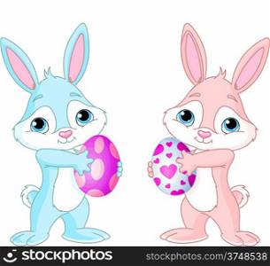 &#xA;Two Cute Easter Bunnies holding Easter Eggs