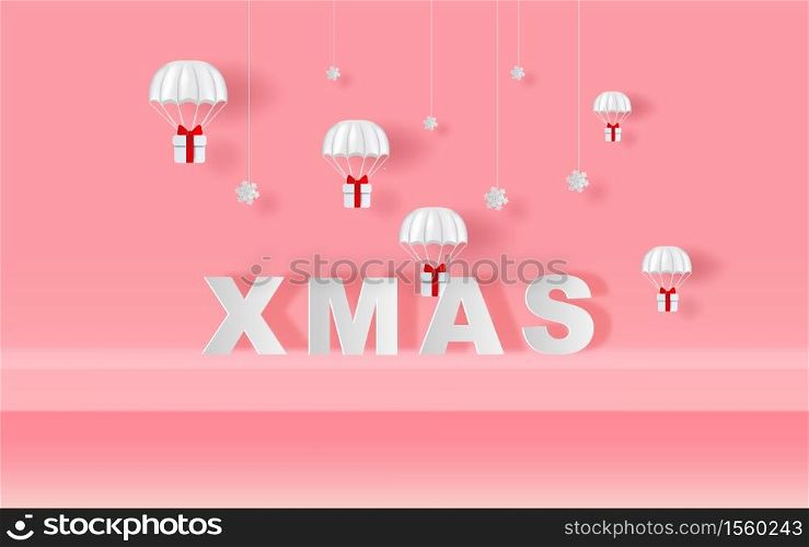 Xmas of Stage mock up Parachute gift box fly air paper cut and craft style. Merry Christmas and Happy new year. Hanging snowing with Holiday winter snow season Simple minimal pink pastel background