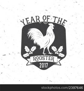 Year of the Rooster 2017 typography. Vector illustration. Xmas retro badge. Concept for shirt or logo, print, st&, patch.. Year of the Rooster 2017 typography. Vector illustration.