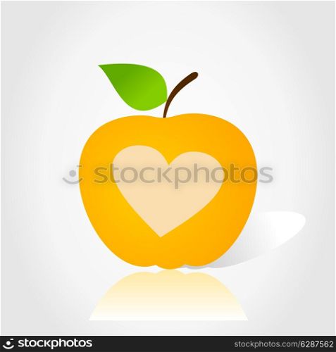 yellow Apple with a heart on white background