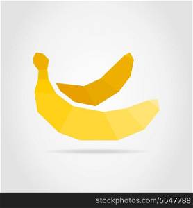 Yellow banana on a grey background