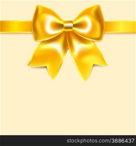 Yellow bow of silk ribbon, isolated on yellowish background