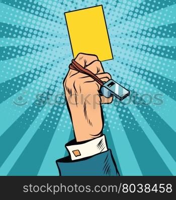yellow card warning business concept pop art retro vector. The football symbol. The referee on the field. yellow card warning business concept