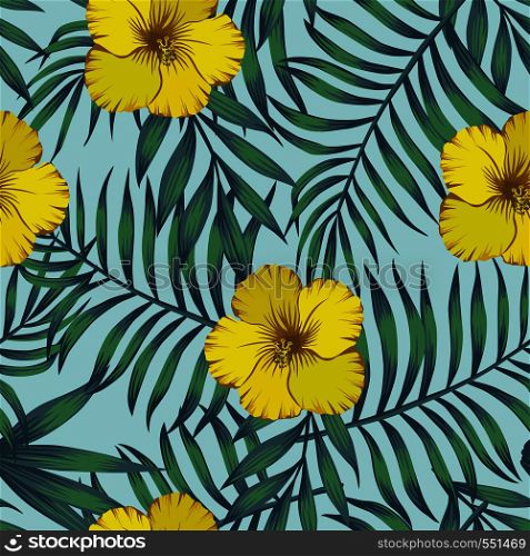 Yellow hibiscus flowers and exotic leaves blue tone seamless pattern on the blue background