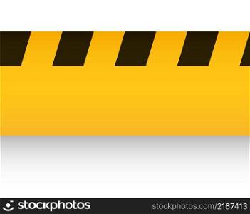 Yellow ribbon with black stripes. Construction site tape isolated on white background. Yellow ribbon with black stripes. Construction site tape