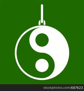 Yin Yang symbol icon white isolated on green background. Vector illustration. Yin Yang symbol icon green