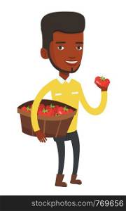 Young african-american farmer holding a box with tomatoes. Farmer standing with box of tomatoes. Farmer showing ripe red tomato. Vector flat design illustration isolated on white background.. Farmer collecting tomatos vector illustration.
