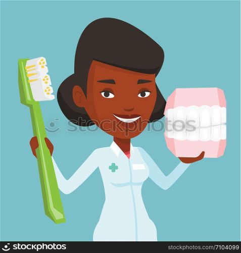 Young african-american female dentist holding dental jaw model and a toothbrush in hands. Friendly dentist showing dental jaw model and toothbrush. Vector flat design illustration. Square layout.. Dentist with dental jaw model and toothbrush.