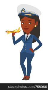 Young african-american female pilot holding a model of airplane in hand. Female airline pilot in uniform. Pilot with model of airplane. Vector flat design illustration isolated on white background.. Cheerful airline pilot with model of airplane.