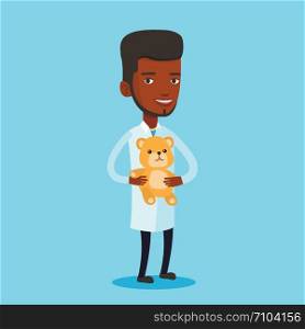 Young african-american pediatrician in medical gown. Male pediatrician doctor holding a teddy bear. Male pediatrician doctor standing with a teddy bear. Vector flat design illustration. Square layout.. Pediatrician doctor holding teddy bear.