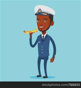Young african-american pilot holding a model of airplane in hand. Cheerful airline pilot in uniform. Smiling pilot with model of airplane. Vector flat design illustration. Square layout.. Cheerful airline pilot with model of airplane.