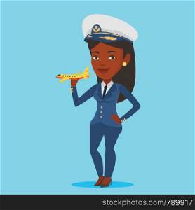 Young african-american pilot holding a model of airplane in hand. Cheerful female airline pilot in uniform. Smiling female pilot with model of airplane. Vector flat design illustration. Square layout.. Cheerful airline pilot with model of airplane.