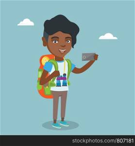 Young african-american traveler woman making selfie. Full length of smiling traveler woman with a backpack and binoculars taking photo with a mobile phone. Vector cartoon illustration. Square layout.. Young african-american traveler making selfie.