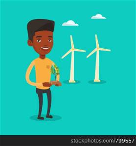 Young african-american worker of wind farm. Man holding in hands green small plant in soil on the background of wind turbines. Green energy concept. Vector flat design illustration. Square layout.. Man holding green small plant vector illustration.