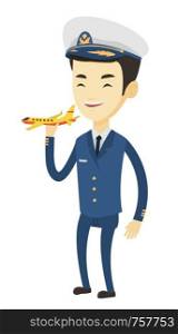 Young asian airline pilot holding model of airplane. Cheerful airplane pilot in uniform. Airplane pilot standing with model of airplane. Vector flat design illustration isolated on white background.. Cheerful airplane pilot with model of airplane.