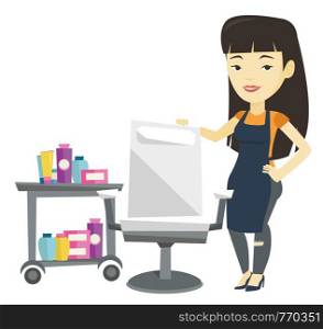 Young asian hair stylist standing near armchair and table with cosmetics in barber shop. Hair stylist standing at workplace in barber shop. Vector flat design illustration isolated on white background. Hair stylist at workplace in barber shop.