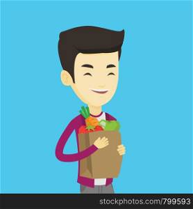 Young asian man carrying grocery shopping bag with vegetables. Man holding grocery shopping bag with healthy food. Man with grocery shopping bag. Vector flat design illustration. Square layout.. Happy man holding grocery shopping bag.