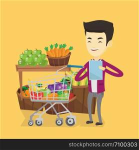Young asian man checking shopping list. Smiling man holding shopping list near trolley with products. Happy man writing in shopping list. Vector flat design illustration. Square layout.. Man with shopping list vector illustration.