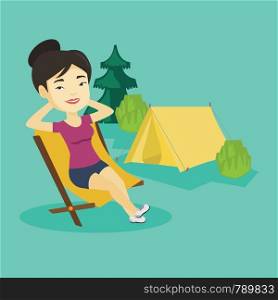 Young asian woman relaxing in camping. Smiling woman sitting in chair on the background of camping site. Relaxed woman enjoying vacation in camping. Vector flat design illustration. Square layout.. Woman sitting in folding chair in the camp.