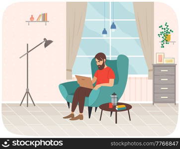 Young bearded man sitting on armchair with laptop, working with electronic equipment in his hands. Male character studying remotely, watches social media, serfing Internet. Person doing homework. Young man sitting on armchair with laptop, studying remotely, watches social media, serfing Internet