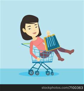 Young carefree customer having fun while riding by shopping trolley. Cheerful asian woman with a lot of shopping bags sitting in shopping trolley. Vector flat design illustration. Square layout.. Happy woman riding by shopping trolley.