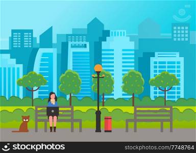 Young cartoon brunette girl wearing scarf sits on bench in a park with laptop on her lap. City park, street lamp, cat, cityscape, skyscrapers, buildings. Walking in the park. Flat vector image.. Young girl sits in city park with a laptop on a bench. Houses and buildings in the background