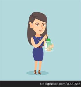 Young caucasian business woman holding a glass jar with money. Business woman saving money in a glass jar. Business woman putting money into a glass jar. Vector cartoon illustration. Square layout.. Caucasian woman putting dollar into a glass jar.
