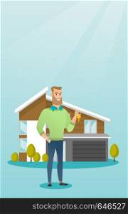 Young caucasian happy new homeowner showing key on the background of his house. Full lenght of cheerful homeowner holding key in front of new house. Vector flat design illustration. Vertical layout.. Young caucasian homeowner with key.